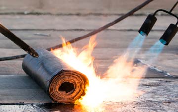 Start asphalt flat roofing repairs